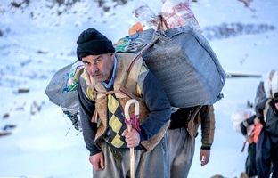 عکس قدیمی: کولبران قاجار حدود ١٩٠٠ 